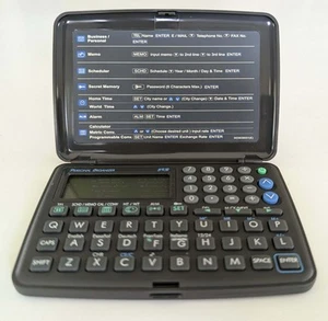Bloomberg M23036001 PDA Électronique PC Noir Poche Organisateur Personnel Calculatrice - Photo 1 sur 5