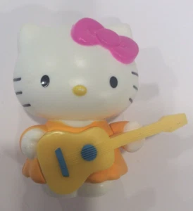 McDonalds 2013 Hello Kitty with Guitar Wobble Kids Happy Meal Toy Figure Topper - Picture 1 of 2