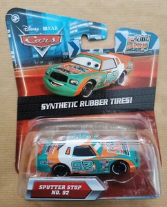 Disney Pixar Cars SPUTTER STOP # 92 RUBBER TIRES KMART Nuovo in Blister Ottimo - Foto 1 di 6