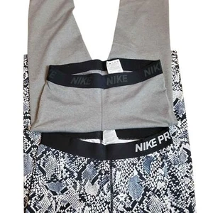 2 Paar Damen M Nike Capri Leggings Mid Rise grau Schlangenleder Training Laufen - Bild 1 von 4