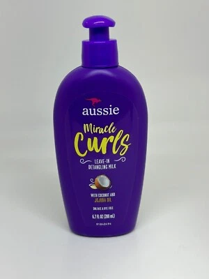 Leche desenredante Aussie Miracle Curls sin enjuague 6,7 fl oz con aceite de jojoba de coco Foto 1 de 4