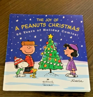 The Joy Of A Peanuts Christmas 50 Years Of Holiday Comics Charles Schulz 2000 - Image 1 of 2