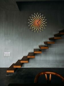 Fireworks II - large wooden sunburst wall clock in copper / gold by ardeola