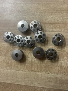 10 New Elna Sewing Metal Bobbins Star Series 11,13,21,23,31,33,41,43,62,72,74 - Picture 1 of 1