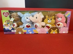 NIB AUSTRALIAN 40TH ANNIVERSARY MOVIE 5 PACK CARE BEARS DOG ELEPHANT LION COUSIN - Picture 1 of 2