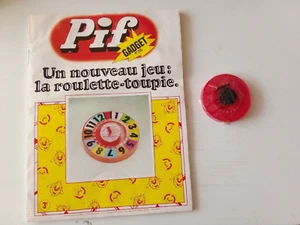 F 13 BD PIF GADGET AVEC GADGET  N 255 LA ROULETTE TOUPIE JEU DE PARCOURS L OIE a - Picture 1 of 7