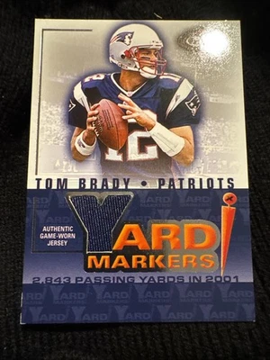 2002 TOM BRADY FLEER BOX SCORE YARD MARKERS GAME WORN JERSEY PATCH PATRIOTS - Image 1 of 2