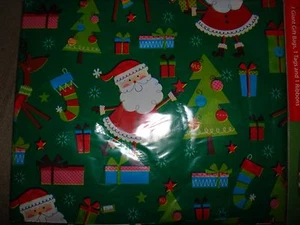 SACCHETTO REGALO NATALE GIGANTE VERDE CON BABBO NATALE E ALBERI 36" X 44" - Foto 1 di 4