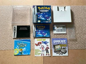Pokemon Zafiro (GBA, 2003) - CAJA + MANUAL + PÓSTER + TARJETA ELECTRÓNICA SOLAMENTE *AUTÉNTICO - Imagen 1 de 15