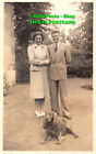 R406098 Woman and Man. Dog. Old Photography. Postcard