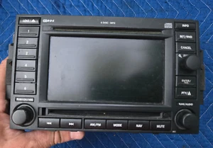 Jeep Dodge Chrysler 2006-2009 DVD GPS 6 CD MP3 radio navegación 05064184AC OEM - Imagen 1 de 10