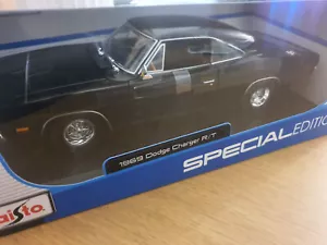 Caricabatteria Maisto Dodge 1969 R/T nero (modello auto scala 1:18) - Foto 1 di 1