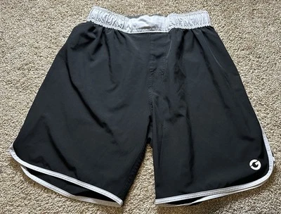 Pantalones cortos de lucha dorados talla S para hombre Foto 1 de 4