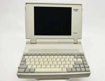 Vintage Toshiba Satellite T1850 Laptop Powers On - Image 1 of 4
