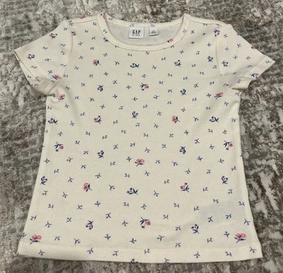Camisa de manga corta Gap talla 6-7 para niñas blanca con flores pequeñas azules y rosas Foto 1 de 4