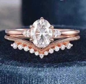 Anello da sposa 2,80 CTW taglio ovale moissanite abbinato placcato oro rosa 14 carati - Foto 1 di 10