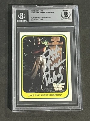 JAKE “THE SNAKE” ROBERTS 1991 MERLIN WWF SIGNED AUTOGRAPHED CARD BAS AUTHENTIC - Image 1 of 2