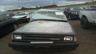 Used Left Door Mirror fits: 1988 Mazda B-2200 Manual dealer installed black Left - Image 1 of 4