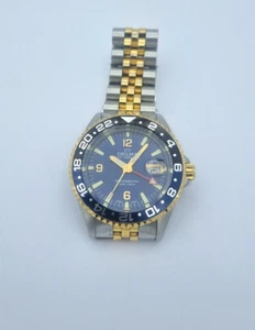 Delma Santiago GMT Meridian 52702.648.6 Edelstahl Quarz Herrenuhr - Bild 1 von 4