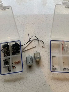 scalextric motor X 2 plus various spare parts axles pick ups and storage boxes - Picture 1 of 4