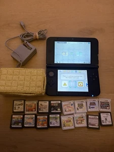 Sistema de juegos portátil Nintendo 3DS XL 4 GB con 16 juegos - Paquete de Navidad - Imagen 1 de 11