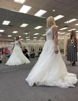 Ivory bridal gown by Oleg Cassini from David’s Bridal - Image 1 of 4