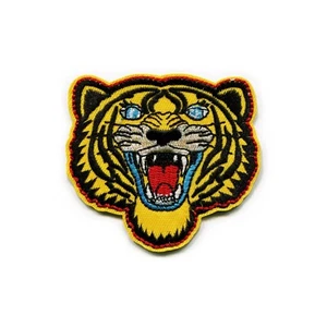 Aplique hágalo usted mismo bordado cara de tigre amarillo hierro - Imagen 1 de 2