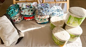 20x Modern cloth Nappies, Plus Extra Inserts And 5x Rolls Bamboo Liners - Picture 1 of 3