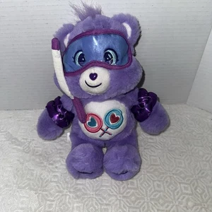 Peluche púrpura con snorkel Care Bears Share Bear verano 2025 8,5" - Imagen 1 de 7