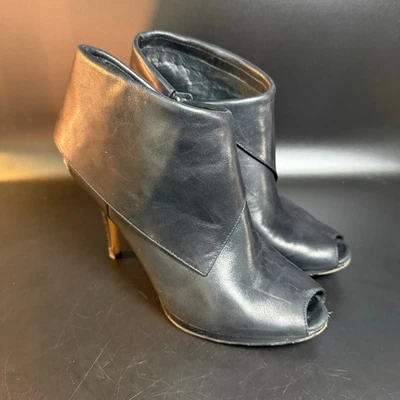 Botines Michael Kors de cuero negro con punta abierta para mujer talla 8M Foto 1 de 4