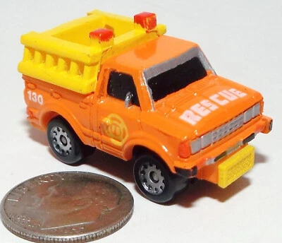 Small Micro Machine Datsun Fire Truck in Orange Marked number 130 - Image 1 of 4
