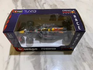 Bburago 1:43 Race F1 Car RB19 Oracle Red Bull Formula 1 DieCast Verstappen Perez - Picture 1 of 7