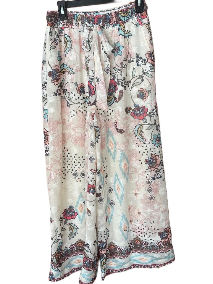 Pantalones Reba para mujer blancos con superposición floral talla mediana  Foto 1 de 4
