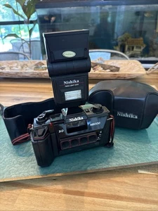 Nishika N8000 3D Quadra obiettivo 35 mm fotocamera pellicola con flash e custodia come nuova - Foto 1 di 18