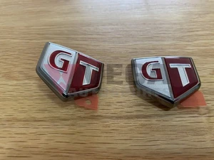 Emblems "GT" (Front Fender) Set to suit Nissan Skyline R34 GTR 63897-AA400 / 638 - Picture 1 of 2