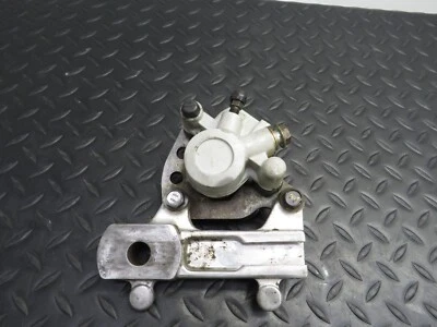 91-01 SUZUKI RM 80 RM80 OEM REAR BRAKE CALIPER AND BRACKET 69100-02B44-999 - Image 1 of 4