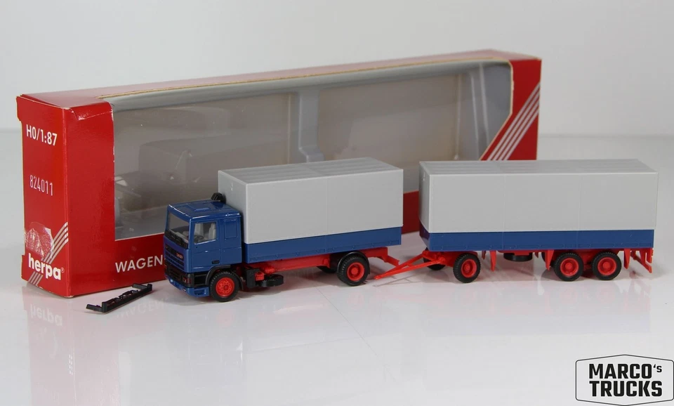 Herpa DAF 95 flatbed/curtain trailer truck 2a/3a blue/red No. 824011 1:87 /H2348 - Image 1 of 1