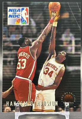 1993-94 SkyBox Premium #6 Hakeem Olajuwon Houston Rockets NBA on NBC - Image 1 of 2