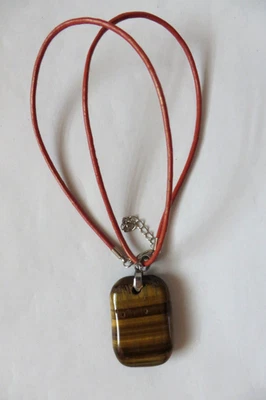 Schöner Tigerauge Anhänger in Kissenform mit Lederband . - Bild 1 von 3