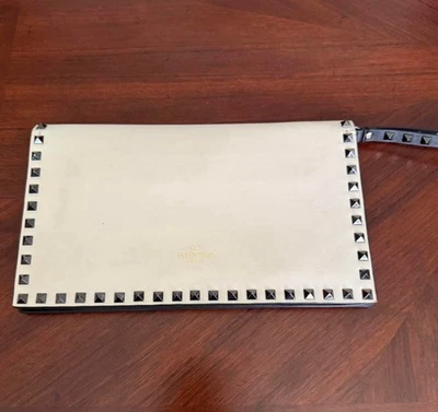 Valentino Rockstud  cream-colored clutch with iconic Valentino pyramid studs. - Image 1 of 4