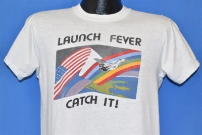 Camiseta vintage años 80 LAUNCH FEVER CATCH IT NASA SPACE TRANSBORDADOR BANDERA EE. UU. ARCO IRIS M Foto 1 de 3