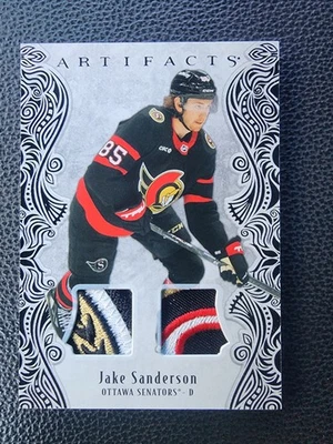 2025-26 Artifacts Jake Sanderson Black Material /5 - Image 1 of 2