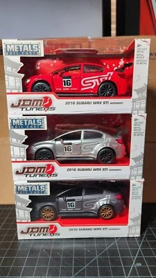 3 Jada JDM Tuners 2016 Subaru WRX STI Widebody (Red, Silver, Grey) 1:32 - Image 1 of 4