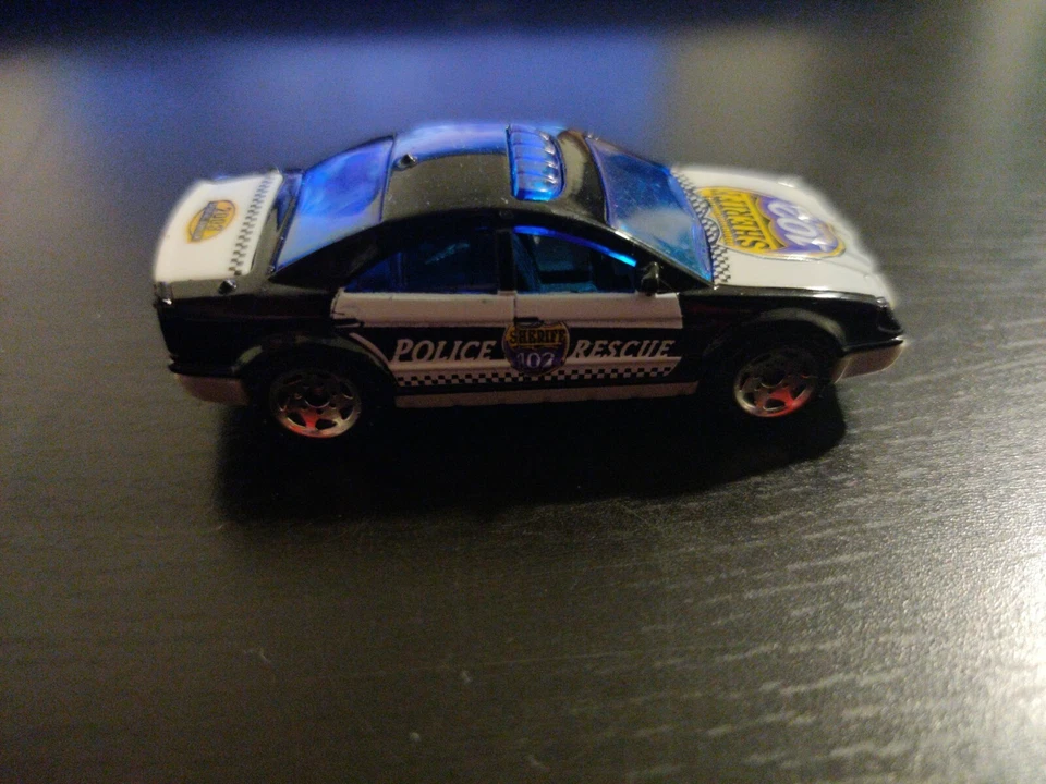 RARE Sheriff Badge 102 Police Rescue 2003 Special Edition 1:64 by MATCHBOX  - Image 1 of 4