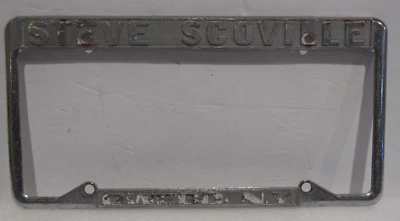 Marco de matrícula de metal original Steve Scoville Pontiac Buick Owego NY de colección Foto 1 de 2