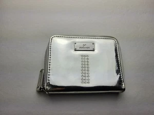 Cartera Swarovski metálica plateada con cremallera alrededor - Imagen 1 de 5