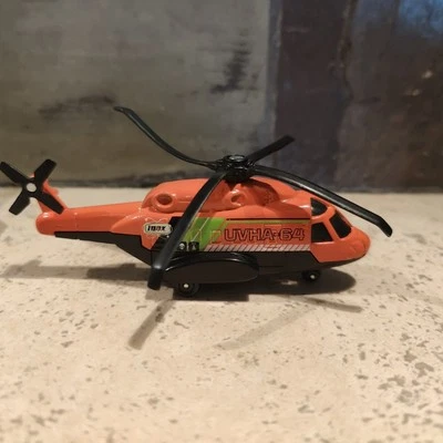 2003 MATCHBOX MISSION CHOPPER UVHA-64 ORANGE DIECAST HELICOPTER - Image 1 of 4