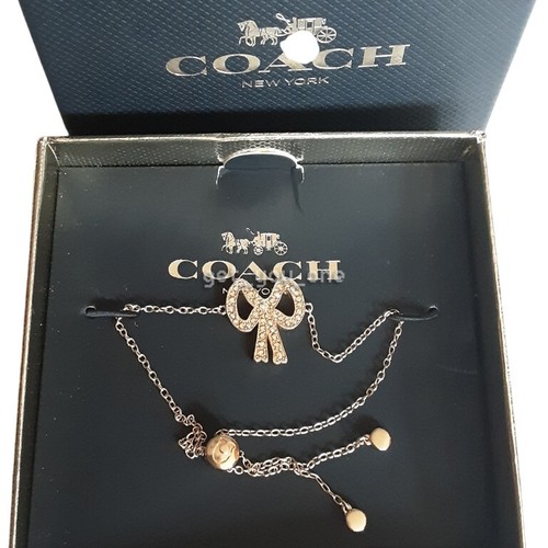NUOVO in scatola COACH Pave cristallo fiocco cursore bracciale tono oro gioielli