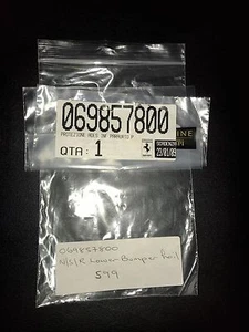 ORIGINAL FERRARI 599 GTB FIORANO LH HINTERE UNTERE STOSSSTANGE FOLIE, TEILENUMMER 69857800 - Bild 1 von 1