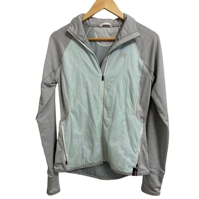 New Balance Mujer Aqua Cortavientos Chaqueta Pequeña Foto 1 de 4